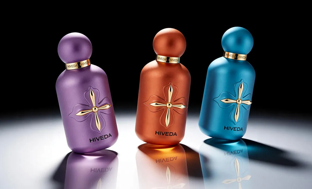BD-PF-06 perfume bottle color variants in purple orange and teal