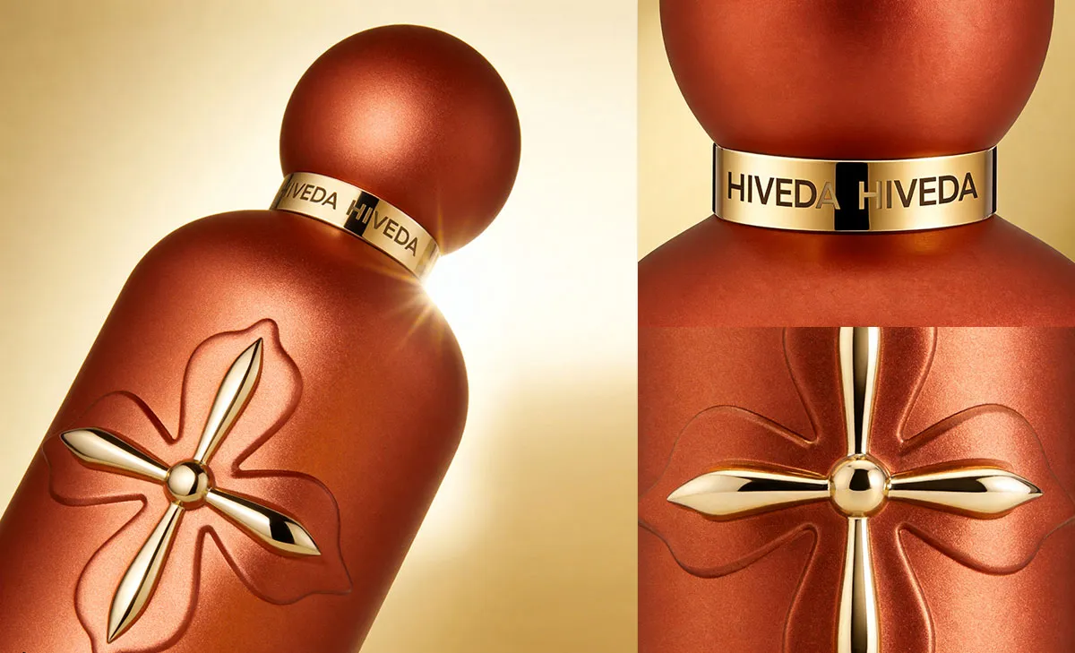 close-up of BD-PF-06 gold floral ornament and soft coated bottle surface