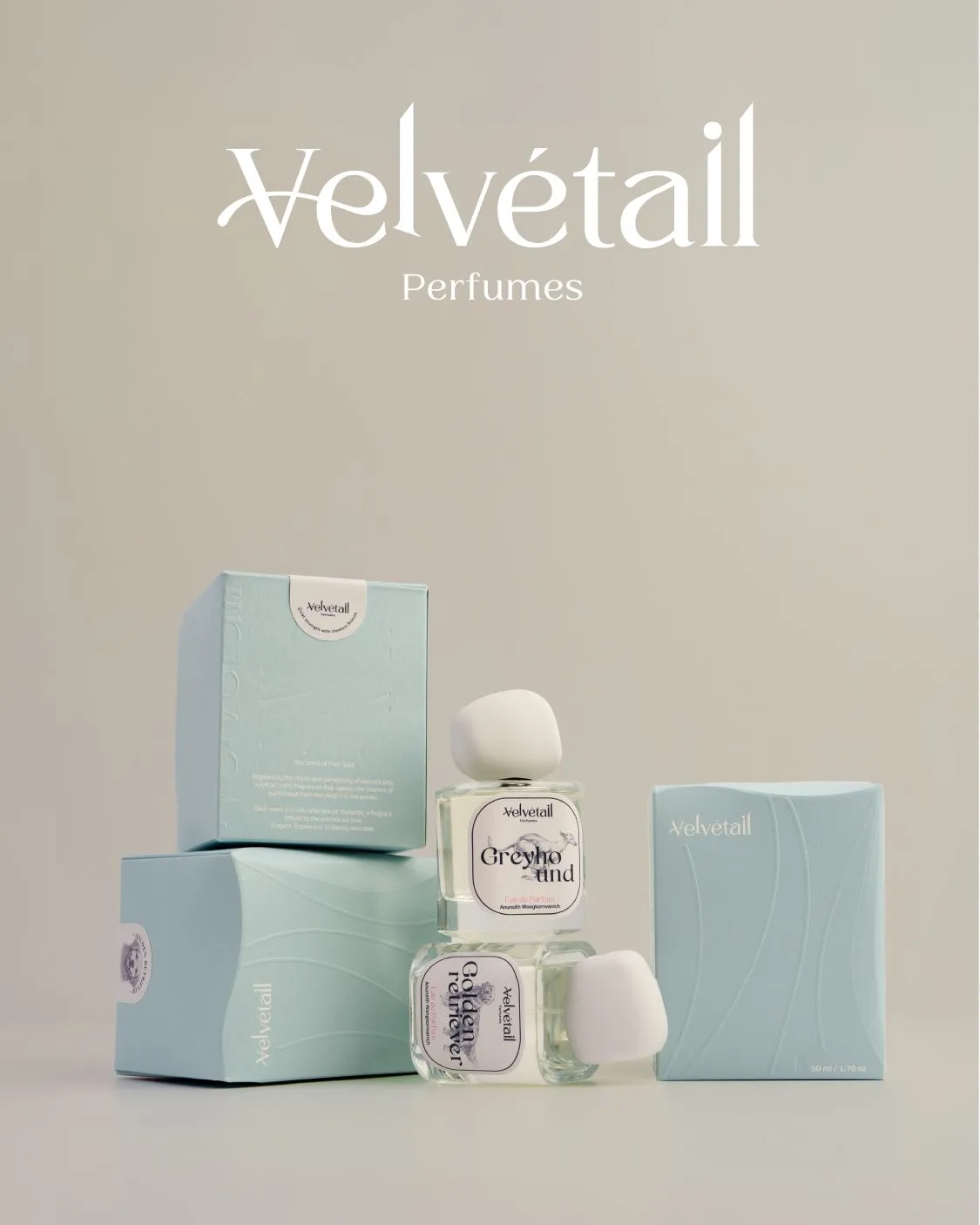 Velvétail Greyhound perfume bottle displayed with pale blue secondary packaging boxes